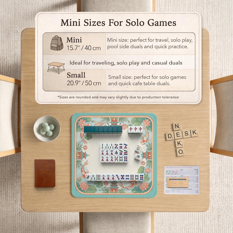 May include: A tabletop setup featuring a teal and white Mahjong set with tiles, a small brown notebook, and a bowl of green spheres. The text "Mini Sizes For Solo Games" is displayed above the set, with size details of 15.7 inches / 40 cm and 20.9 inches / 50 cm.