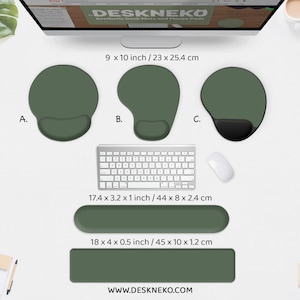 May include: An overhead shot displays a computer setup with green desk accessories. Three different green ergonomic mouse pads are shown, along with a keyboard, mouse, and wrist rests. The website address is www.deskneko.com.