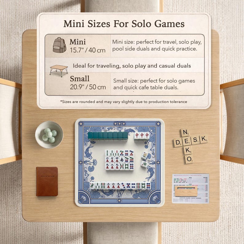 May include: A wooden table displays a mini Mahjong set with blue and white tiles, a small brown notebook, and a bowl of green stones. The text "Mini Sizes For Solo Games" is at the top, with size details in inches and centimeters.
