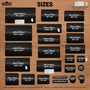 May include: Image showcasing various sizes of black desk mats with a mountain landscape design. Sizes range from 10" x 8" to 47" x 23.5". Includes a real-size keyboard and mouse for scale. The word "SIZES" is at the top.