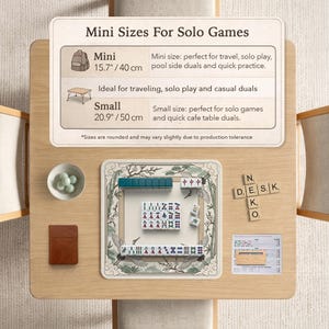 May include: A wooden table with a Mahjong set, a small brown book, and a bowl of green spheres. The table also features a sign with the text "Mini Sizes For Solo Games" and measurements in inches and centimeters.
