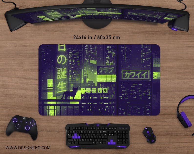 May include: A rectangular mouse pad with a neon cityscape design in purple and green, featuring Japanese text and a silhouette of a cat. The pad measures 24 x 14 inches.