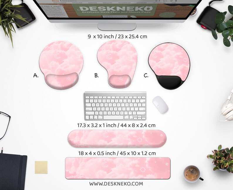 May include: A collection of pink cloud-themed desk accessories, including three mouse pads with wrist rests, a keyboard wrist rest, and a desk mat. The mouse pads are 9 x 10 inches, the keyboard rest is 17.3 x 3.2 inches, and the desk mat is 18 x 4 inches. The website address is www.deskneko.com.