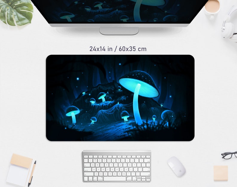 May include: A black mousepad featuring a glowing blue mushroom scene. The mousepad measures 24 inches by 14 inches. The design includes several mushrooms with bright blue caps and stems, set against a dark, forest-like background.