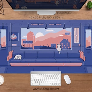 May include: A large blue and pink desk mat with a train interior design. The mat features a cityscape scene visible through a window, with two white cats. The mat measures 40 x 20 inches.