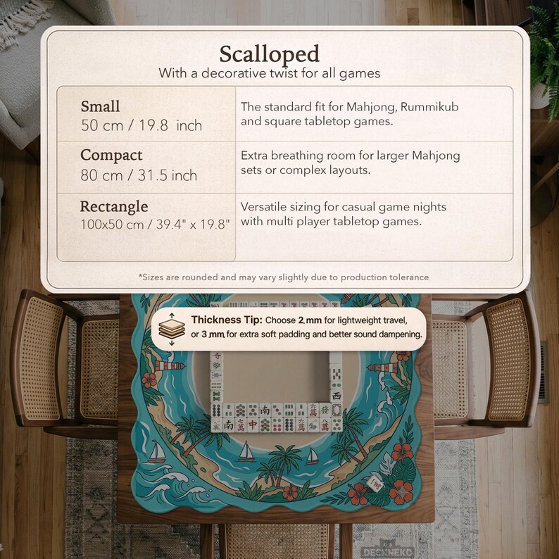 May include: A decorative, scalloped Mahjong game mat with a tropical island design. The mat is shown on a wooden table with two chairs. The mat is available in three sizes: 50 cm, 80 cm, and 100x50 cm.