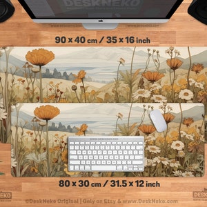 May include: A desk mat with a watercolour landscape design featuring wildflowers in shades of yellow, orange, and white. The mat measures 90 x 40 cm and 80 x 30 cm. The text "DeskNeko" and "www.DeskNeko.com" are visible.