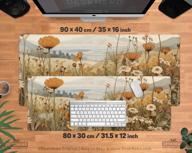 May include: A desk mat with a watercolour landscape design featuring wildflowers in shades of yellow, orange, and white. The mat measures 90 x 40 cm and 80 x 30 cm. The text "DeskNeko" and "www.DeskNeko.com" are visible.