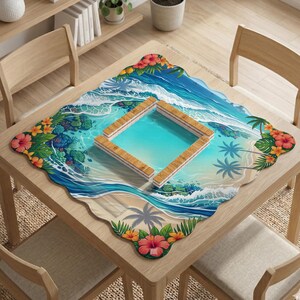May include: A square table mat with a scalloped edge featuring a tropical beach scene with blue ocean waves, sandy shores, palm trees, and colorful hibiscus flowers. A wooden square frame sits in the center of the mat on a wooden table.