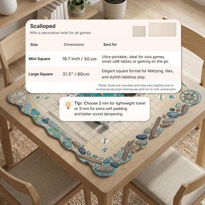 May include: A beige, scalloped-edge game mat with a nautical design, featuring a compass rose and various sea-themed elements. The mat is shown on a wooden table and is available in two sizes: 19.7 inches (50 cm) and 31.5 inches (80 cm).