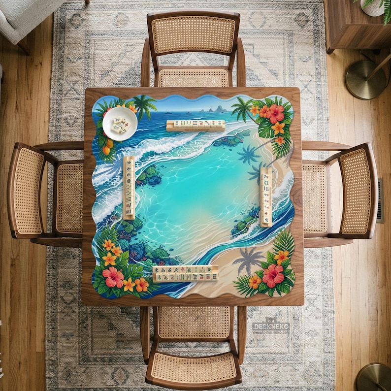 May include: A wooden game table with a tropical beach scene design. The table is surrounded by four woven chairs. The table's surface features a turquoise ocean, sandy beach, palm trees, and colorful flowers. Game pieces are placed on the table.
