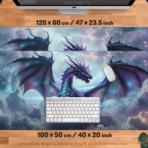 May include: Two rectangular desk mats featuring a fantasy dragon design. The larger mat measures 47 x 23.5 inches, and the smaller one is 40 x 20 inches. The dragon has blue and purple scales, red eyes, and large wings, set against a cloudy sky.