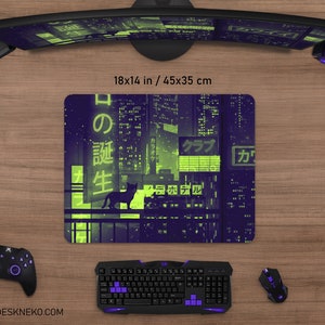 May include: A rectangular mouse pad with a purple and green cityscape design, featuring Japanese text and a silhouette of a cat. The mouse pad measures 18 x 14 inches.
