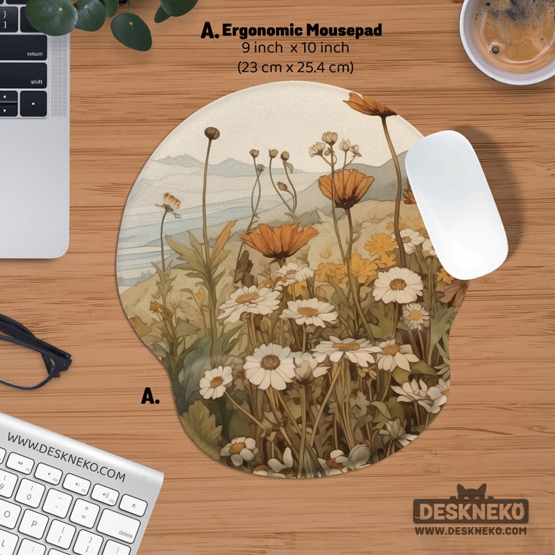 May include: Ergonomic mousepad, 23 cm x 25.4 cm, with a floral design of white daisies and orange poppies. The mousepad has a wrist rest and the text "A. Ergonomic Mousepad". A white mouse is next to the mousepad.