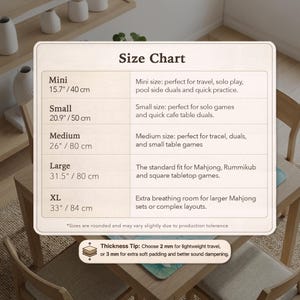 May include: A rectangular size chart for a game mat with five categories: Mini at 15.7 inches, Small at 20.9 inches, Medium at 26 inches, Large at 31.5 inches, and XL at 33 inches. A thickness tip suggests 2 mm or 3 mm options for the mat.