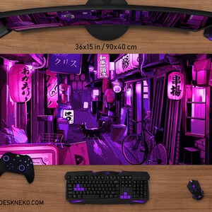 May include: A large rectangular desk mat with a vibrant purple and pink illustration of a Japanese street scene. The mat measures 36x15 inches and features a black cat, lanterns, and Japanese text.