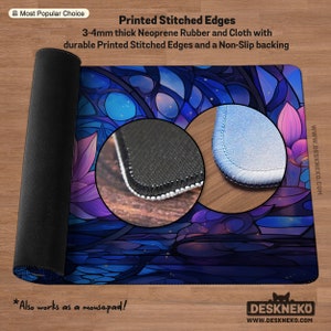 May include: A rolled-up mousepad with a vibrant stained-glass design in shades of blue, purple, and pink. The mousepad features printed stitched edges and a non-slip backing. The text on the mousepad says "Also works as a mousepad!"