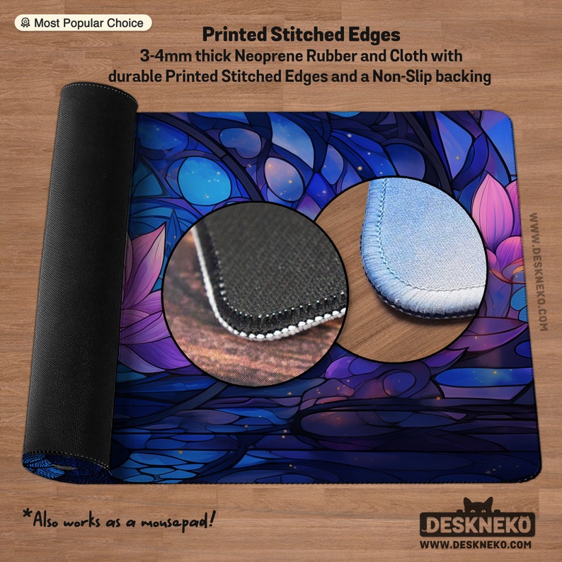 May include: A rolled-up mousepad with a vibrant stained-glass design in shades of blue, purple, and pink. The mousepad features printed stitched edges and a non-slip backing. The text on the mousepad says "Also works as a mousepad!"