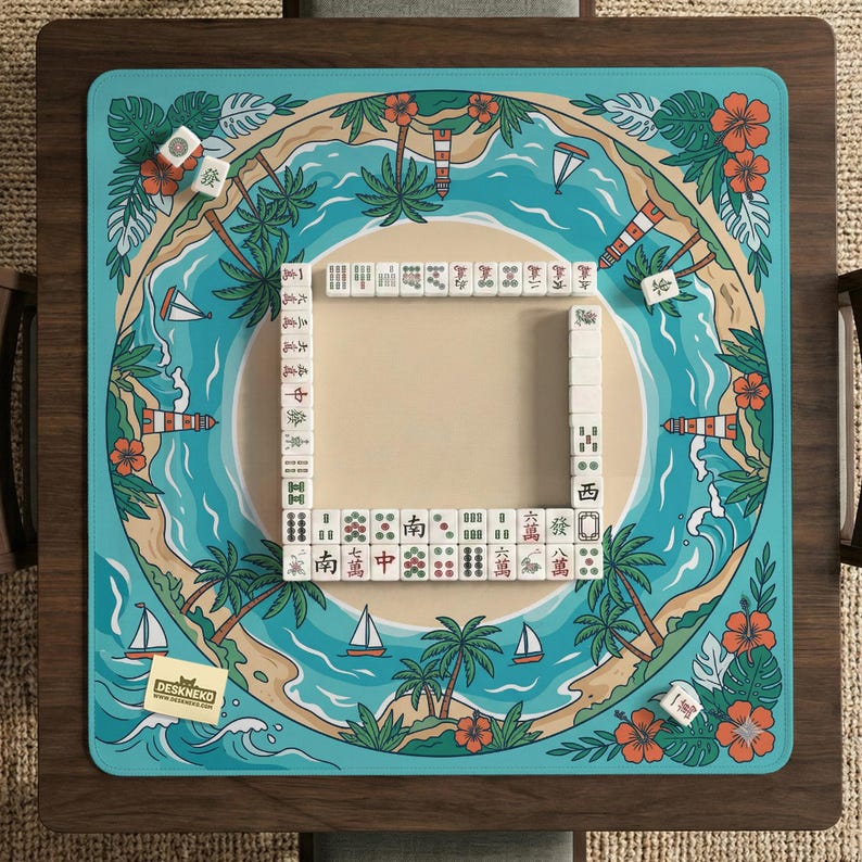 May include: A square mahjong game board with a tropical island design. The board has a teal border with illustrations of palm trees, sailboats, and flowers. White mahjong tiles are arranged in a square, ready for play.