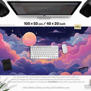 May include: A large desk mat with a dreamy night sky design, featuring a full moon, stars, and fluffy pink and purple clouds. The mat measures 40 x 20 inches and includes a keyboard, mouse, and notebook. The text "DeskNeko" is visible.