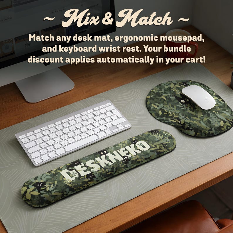 A product photo of a wooden desk featuring a coordinated "Mix & Match" ergonomic mousepad and keyboard wrist rest set from DeskNeko on Etsy. A large desk mat sits under a keyboard and mouse. Resting on it is a keyboard wrist rest and an ergonomic mousepad with a computer mouse. Both accessories feature an aesthetic design printed in high quality. The text above explains that bundle discounts apply automatically when you match any desk mat, ergonomic mouse pad, and wrist rest.