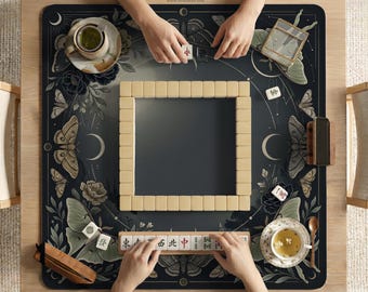 May include: A top-down view of a Mahjong game in progress. The game is set on a wooden table with a dark blue mat featuring moth and floral designs. The game includes beige tiles, tea cups, and a wooden tile holder. The brand name "DESKNEKO" is visible.