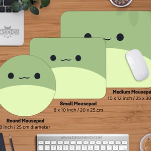 May include: A collection of green mousepads in various shapes and sizes, featuring a cute cartoon frog face design. Includes a round mousepad (8-inch diameter), a small rectangular mousepad (8 x 10 inches), and a medium rectangular mousepad (10 x 12 inches).