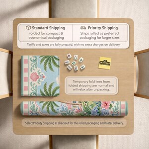 May include: A rolled-up desk mat with a tropical floral design, featuring palm trees, seashells, and pink and blue accents. A matching folded mat and mahjong tiles are also present. The image includes text about shipping options.