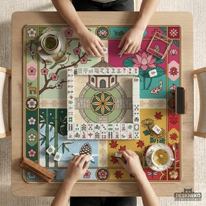 May include: A colorful Mahjong game in progress on a wooden table. The game board features a floral and nature-themed design with a pagoda, koi fish, and bamboo. Players are arranging tiles, with cups of tea nearby.