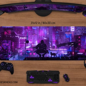 May include: A large rectangular mouse pad with a futuristic cityscape design in shades of purple and pink. The pad measures 31x12 inches. A black cat and a figure are silhouetted against the city. The website address is visible at the bottom.