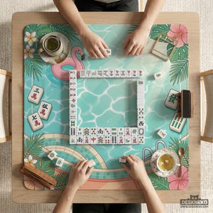 May include: A top-down view of a Mahjong game in progress. The game is set on a wooden table with a tropical-themed mat featuring a pool design, a pink flamingo float, and floral accents. The tiles are arranged in a square, with players' hands visible.