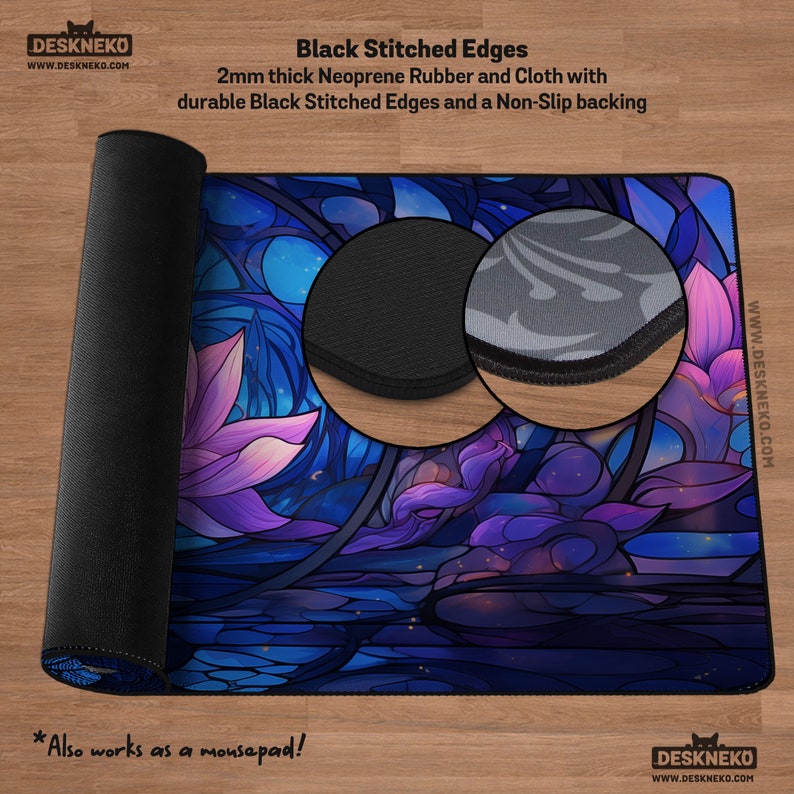 May include: A rolled-up mousepad with a floral stained-glass design in shades of blue, purple, and pink. The mousepad is made of 2mm thick neoprene rubber and cloth with black stitched edges and a non-slip backing. The text "Also works as a mousepad!" is included.