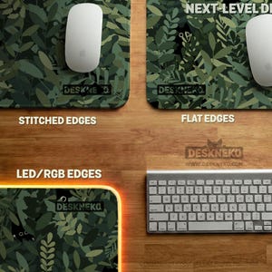 A comparison of three DeskNeko desk mat finishes. On the left, the "STITCHED EDGE" option features durable, low-profile printed sewn edges. On the right, the "FLAT EDGE" option shows a sleek, minimalist non-stitched/unstitched finish. On the bottom left it shows the RGB-LED mousepad option. All mats display vibrant high quality print. These durable deskmat and mousepad choice is available in sizes ranging from small mouse pad to XL, XXL, and 3XL extra large desk mat options.