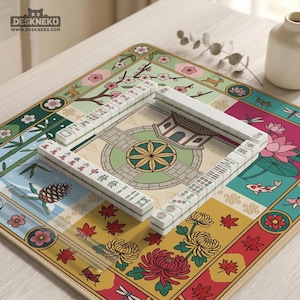 May include: A complete Mahjong set with white tiles and a colorful, floral-themed mat. The mat features various panels with illustrations of flowers, a pagoda, and a koi fish. The tiles are arranged in a square formation, ready for play.