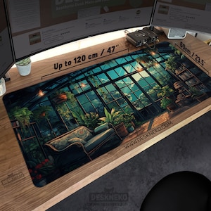 May include: Desk mat with a detailed illustration of a greenhouse interior, featuring plants, a sofa, and large windows. The mat measures up to 120 cm long and 60 cm wide. The website address www.DESKNEKO.COM is visible.