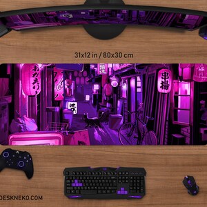 May include: A rectangular mousepad with a vibrant purple and black anime-style illustration of a Japanese street scene. The mousepad measures 31 x 12 inches. A black cat walks down the street, lit by lanterns.
