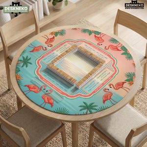 May include: A round game mat featuring a tropical theme with pink flamingos, green palm leaves, and orange flowers. The center displays a square wooden tile rack with game instructions printed in English, including the text DESKNEKO.