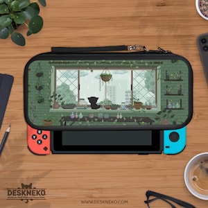 May include: Black Nintendo Switch case featuring a pixelated illustration of a cat looking out a window at a rainy day scene. The case has a black handle and zipper. The Nintendo Switch has red and blue controllers. The website address is visible.