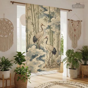 May include: Curtains with a Japanese-inspired design featuring two cranes amidst bamboo and clouds. The color palette includes beige, blue, and green, creating a serene and natural aesthetic. The curtains are hung on a wooden rod, adding a touch of warmth to the room.