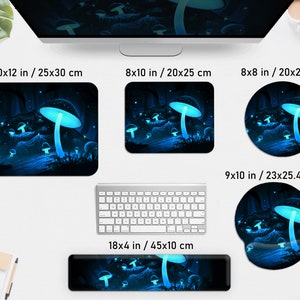 May include: A collection of computer accessories featuring a glowing mushroom design in shades of blue. Includes a 10x12 inch mousepad, a 8x10 inch mousepad, a round 8x8 inch mousepad, a 9x10 inch ergonomic mousepad, and a 18x4 inch wrist rest.