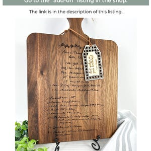Add a metal display stand, personalized wooden gift tag, and more from the add-on listing in the shop.