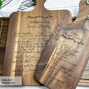 Engraved recipe cutting boards engraved on walnut wood or various sizes. Designs above titles.