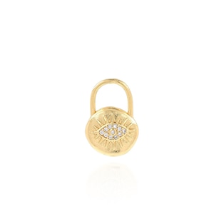 May include: Gold charm with a detailed evil eye design featuring clear sparkling stones.