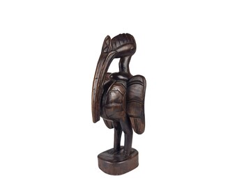 Elegante statuetta in legno di Bucero (Costa d'Avorio, Africa Occidentale)