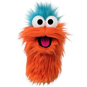 May include: A whimsical puppet with a shaggy orange body and a tuft of blue hair. It has large, white, googly eyes and a matching orange mustache. The puppet's mouth is open, revealing a pink tongue.