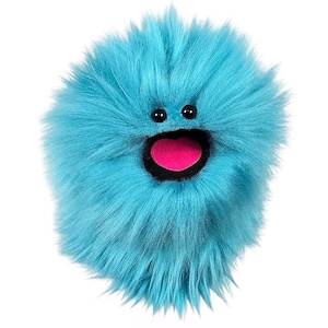 May include: A round, fluffy plush toy covered in bright turquoise faux fur. It features two small, round black plastic eyes positioned above a wide, open black mouth containing a flat, heart-shaped pink tongue centered inside the dark opening.