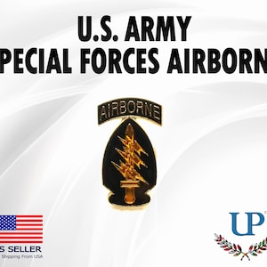May include: A gold-colored U.S. Army Special Forces Airborne pin with a black background and a gold-colored dagger. The pin has the word "AIRBORNE" written in gold letters above the dagger.