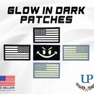 May include: Four glow-in-the-dark iron-on patches featuring the American flag and a smiley face. The patches are on a white background. The text "Glow in Dark Patches" is at the top of the image.