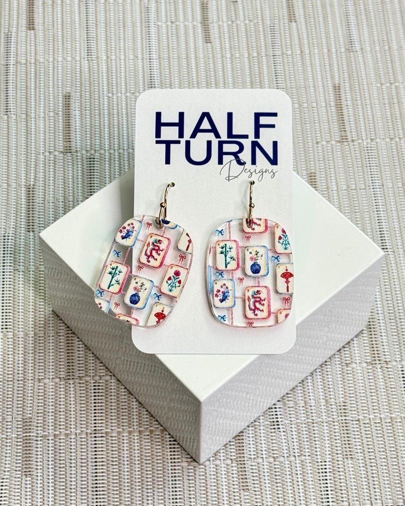 Colorful mahjong tile dangle earrings on clear acrylic with gold stainless steel hooks