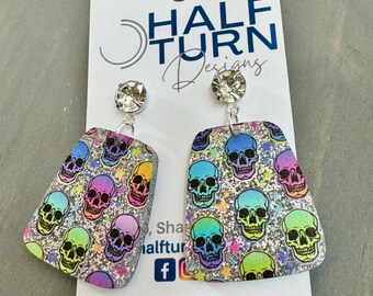 Playful Skull Dangle Earrings with Rhinestone accents, Ombre Pastel Skulls on silver glitter acrylic earrings, Pastel Halloween Jewelry